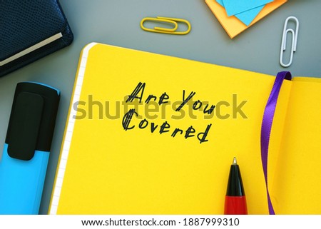 Financial concept meaning Are You Covered with phrase on the piece of paper.
