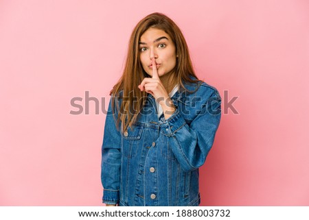 Young skinny caucasian teenager girl keeping a secret or asking for silence.