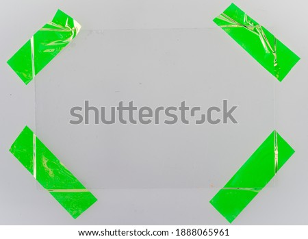 shiny green foil sticker snips on white background with real corner edge bulge, design elements for your social media collage, blend in your photo here. Royalty-Free Stock Photo #1888065961