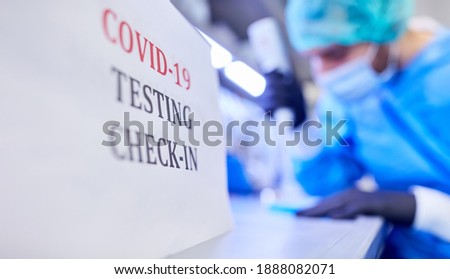 Check-in for Covid-19 rapid test in the laboratory of the clinic in the event of a coronavirus pandemic Royalty-Free Stock Photo #1888082071