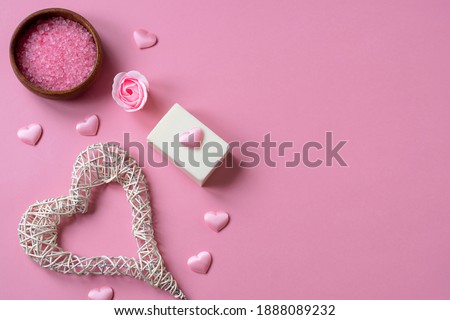 Natural spa set with salt and soap on a pink background. Valentine's day, birthday, mother's day, 8 March. Top view, flat lay. Royalty-Free Stock Photo #1888089232