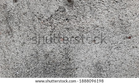 
rough cemen textured walls are gray