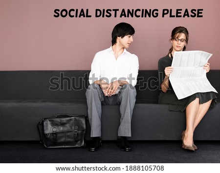 Two business people socially distancing in a waiting room