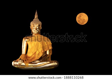 Buddha statue and the moon