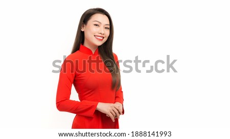 Beautiful young asian woman wearing Vietnam traditional culture red Ao Dai Dress, Vietnam Royalty-Free Stock Photo #1888141993