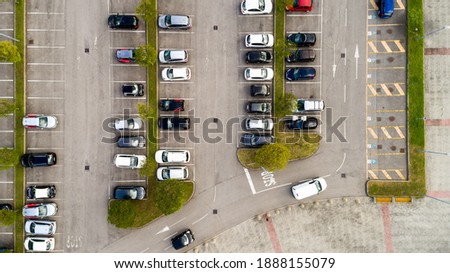 Aerial drone photo of a parking lot, urban city scape