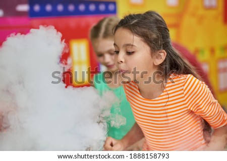 Liquid nitrogen experiment for kids. Fancy show for children. Science for kids.