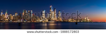 View across Hudson River of skyscrapers of New York City. Manhattan skyline at sunset from Midtown West to Lower Manhattan (Hudson Yards and World Trade Center). NY, USA Royalty-Free Stock Photo #1888172803