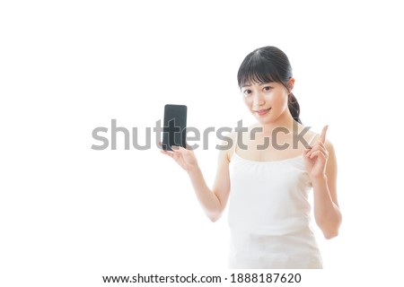 Young woman using smartphone app
