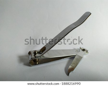 a stainless steel nail clippers isolated on white background
