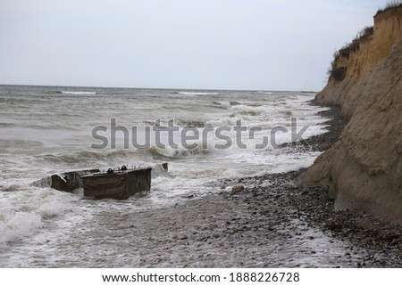 Ruins of bunkers on the beach of the Baltic sea