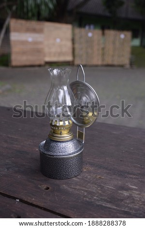 oil lamp on the table with a blurred background