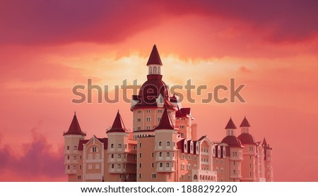 Dreamy castle on a background of fairy sunset sky.