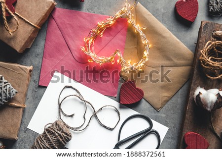 Love message valentine's day. Preparation, gift wrapping, cotton flowers and postcard