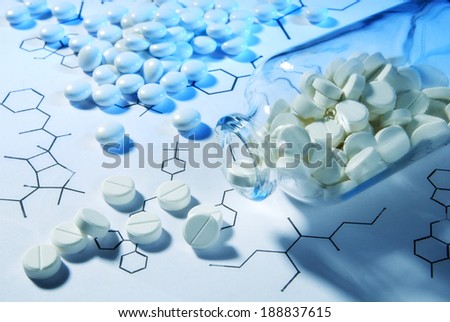 Tablets and structural formulas Royalty-Free Stock Photo #188837615