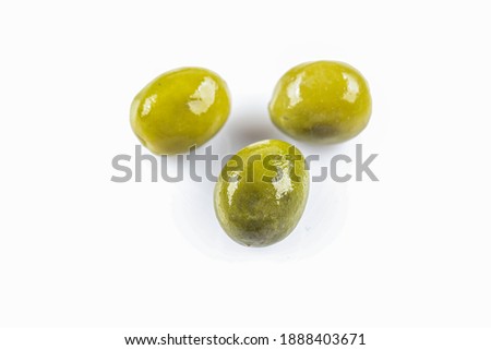 Green olives fruits isolated on white background cutout.