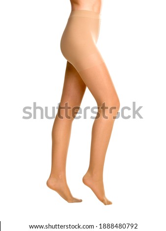 female legs in pantyhose isolated on white background