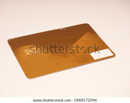 Picture of gold card that can be used for bank transaction or as member card