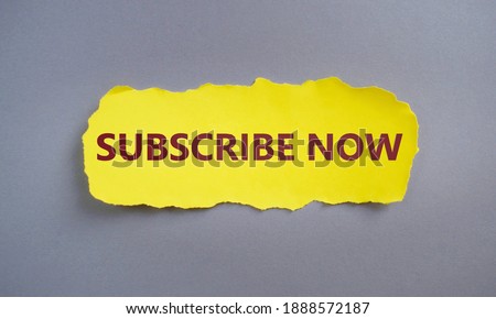 SUBSCRIBE NOW text written on yellow torn paper.Conceptual hand writing showing Subscribe Now. Business photo text to pay money to an organization in order to receive a service.