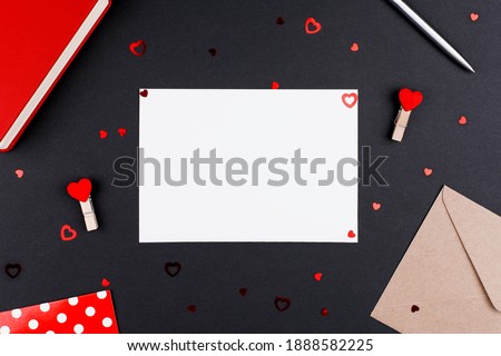 White sheet postcard place for text on Valentine's Day, Flat Lay.