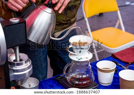 Barista is making American hand brewed coffee
