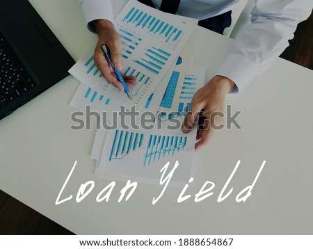 Financial concept about Loan Yield with sign on the sheet.
