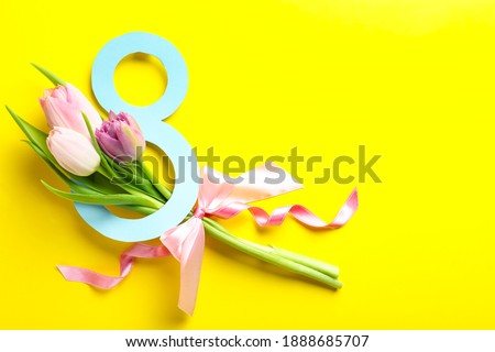 8 March card design with tulips and space for text on yellow background, flat lay. International Women's Day Royalty-Free Stock Photo #1888685707