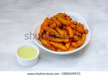 Masala fries with mint chutney Royalty-Free Stock Photo #1888698955