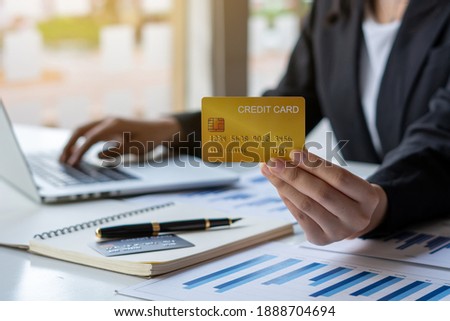 business hands holding credit card and using laptop computer for online shopping, Online payment and shopping