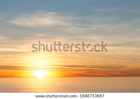 Inspirational tranquil sea with sunset sky. Colorful horizon over the calm water. Batumi, Georgia.  Royalty-Free Stock Photo #1888733887