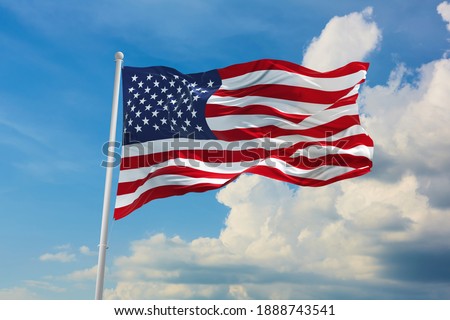 Large  American flag waving in the wind