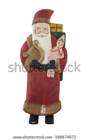 Antique wooden santa isolated on white background