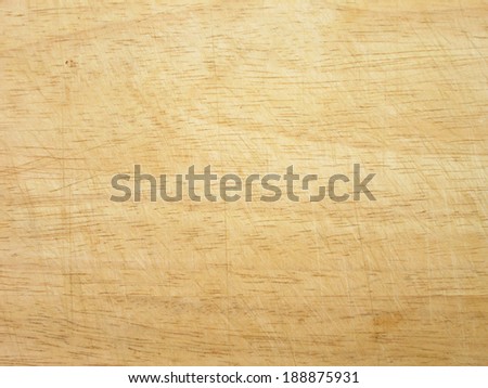 closeup of a worn wooden cutting board