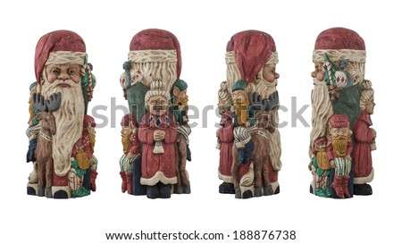 Antique wooden santa set isolated on white background