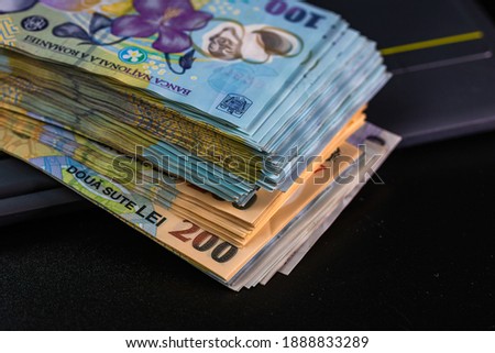 Selective focus on stack of LEI romanian money. Lei banknotes isolated. Royalty-Free Stock Photo #1888833289