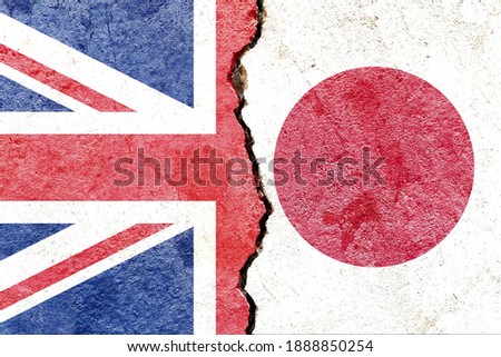 Faded UK VS Japan national flags icon isolated on broken weathered cracked concrete wall background, abstract international political relationship friendship conflicts concept texture wallpaper