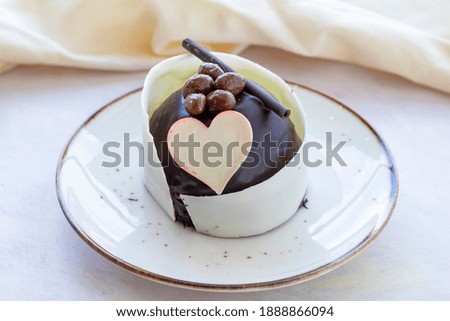 Special design cake. Valentine's day concept cake. White and Black chocolate cake