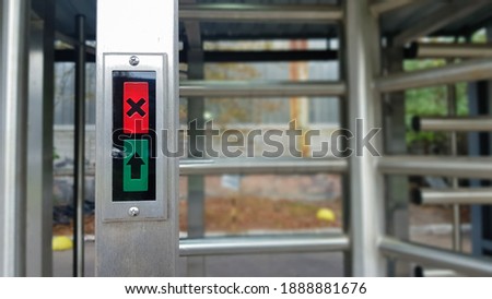 Modern entrance with a high level of security, automatic electronic turnstile, access system and biometrics. Access control. Closed entrance turnstile with prohibited access.