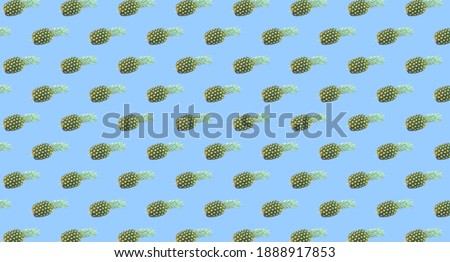 Pineapple on blue background geometric seamless pattern
