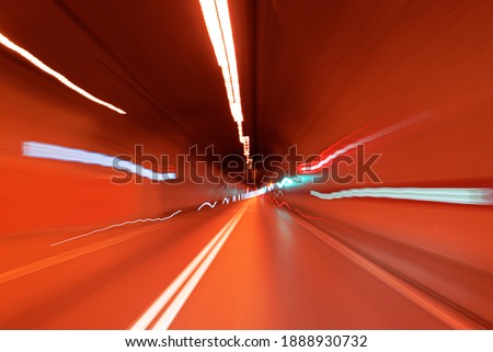 Road in an underground tunnel. Shooted with motion blur. Abstract View.