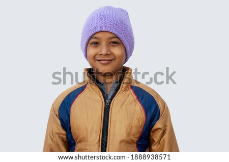 Portrait of boy wearing warm clothing during winter
