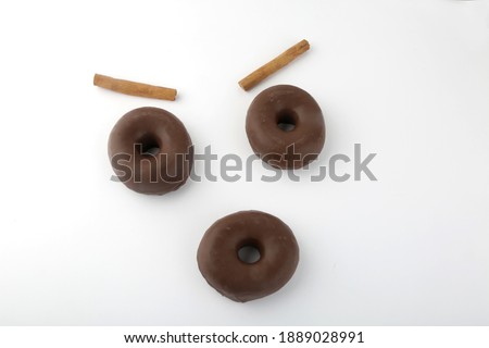 chocolate donuts as a happy face