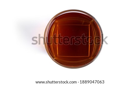Apple juice in glass on a white background. . High quality photo