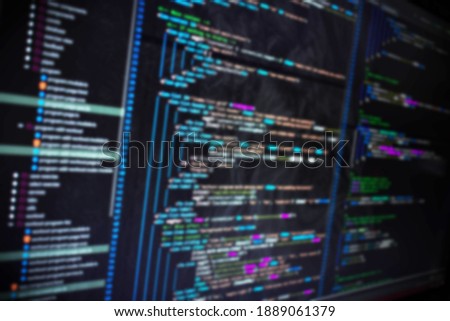 Code on screen blurry background image