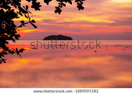 Seascapes of beautiful sunset on the sea beach with pink sky on vacation