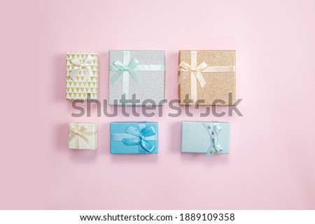 Gift boxes on pink background. Holiday sale concept. Background Of Valentine's Day. View from above. Flat lay