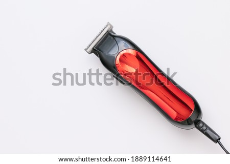 electric hair isolate clipper hair trimmer in white background Royalty-Free Stock Photo #1889114641