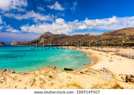Shot of beautiful turquoise beach Falasarna (Falassarna) in Crete, Greece. View of famous paradise sandy deep turquoise beach of Falasarna (Phalasarna) in North West, Crete island, Greece. Royalty-Free Stock Photo #1889149507