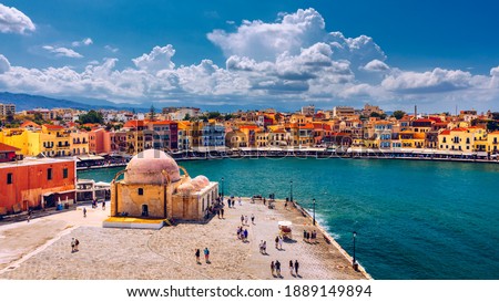 Mosque in the old Venetian harbor of Chania town on Crete island, Greece. Old mosque in Chania. Janissaries or Kioutsouk Hassan Mosque in Chania Crete. Turkish mosque in Chania bay. Crete, Greece. Royalty-Free Stock Photo #1889149894