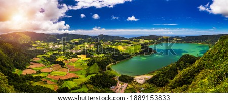 Aerial view of Lagoa das Furnas located on the Azorean island of Sao Miguel, Azores, Portugal. Lake Furnas (Lagoa das Furnas) on Sao Miguel, Azores, Portugal from the Pico do Ferro scenic viewpoint. Royalty-Free Stock Photo #1889153833